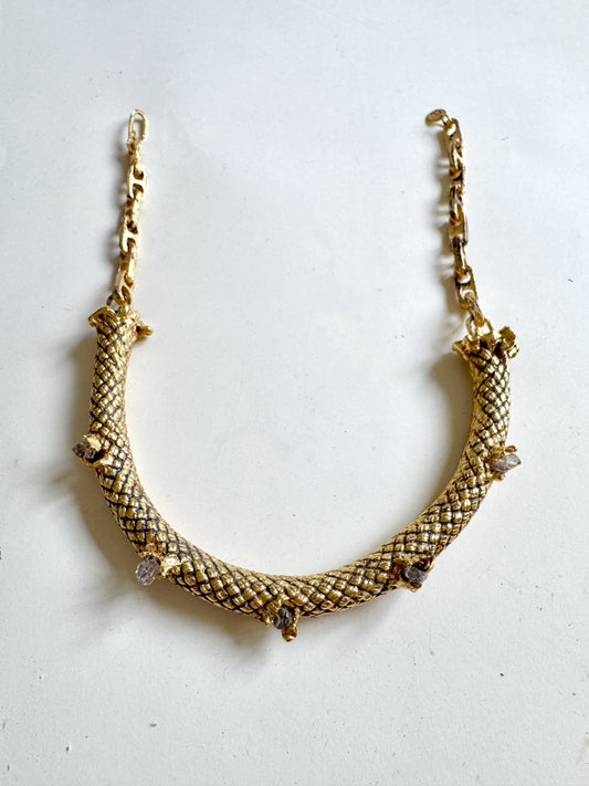 Gold necklace with textured by Angela Lago